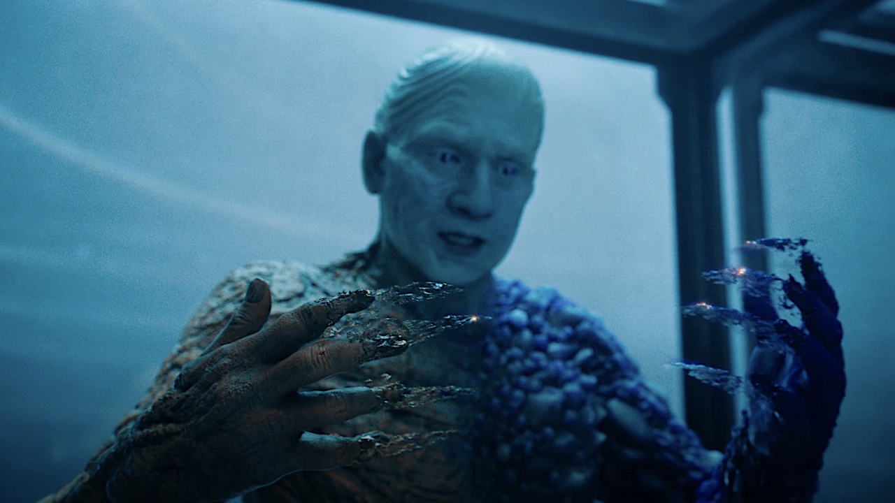 Metamorpho looking at claws coming out of his fingers in James Gunn's Superman