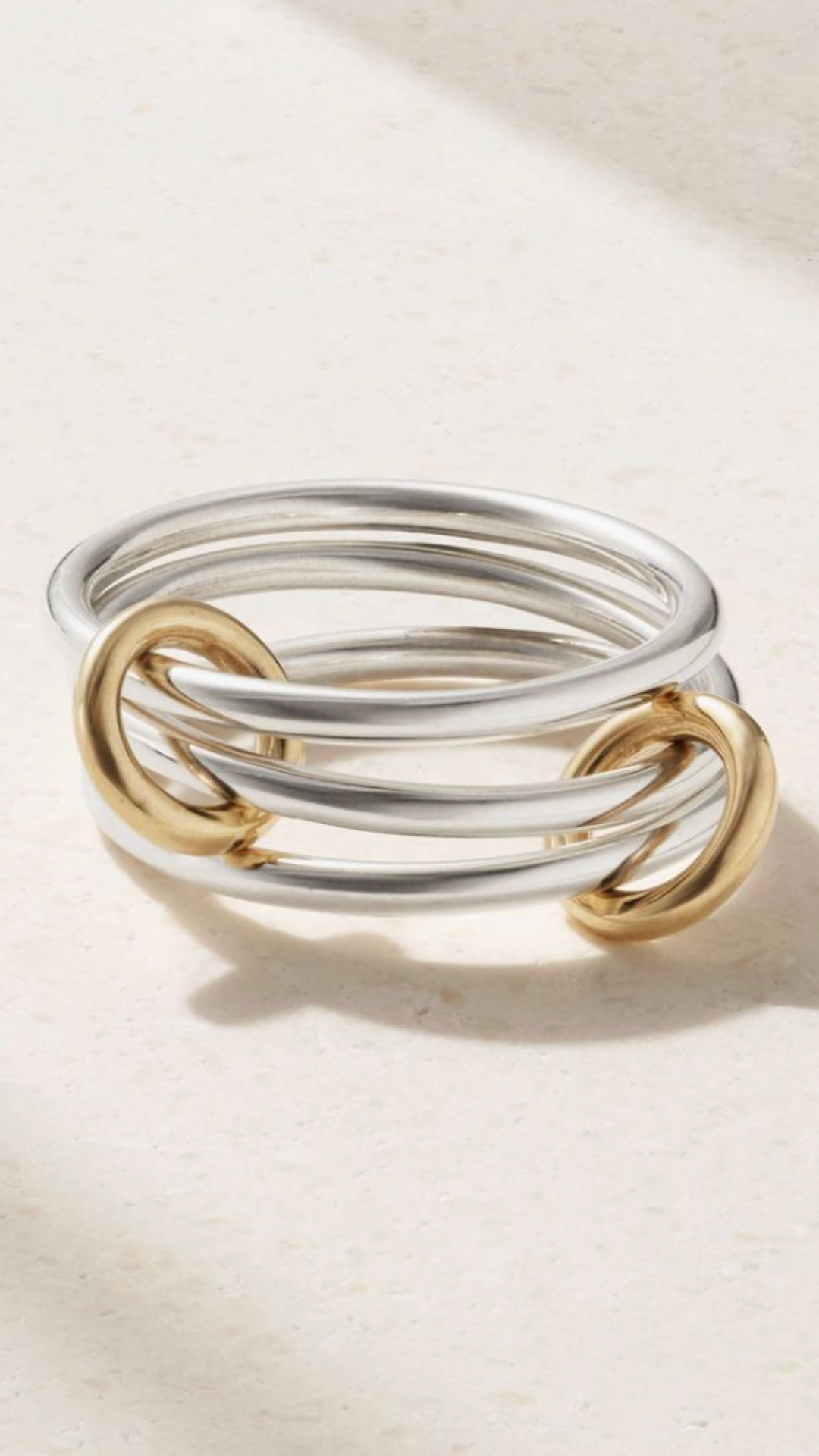 SPINELLI KILCOLLIN, Solarium Set of Three Sterling Silver and 18-Karat Gold Rings