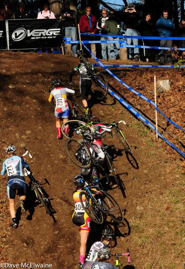 Elite Women scramble up the steepest part of the course