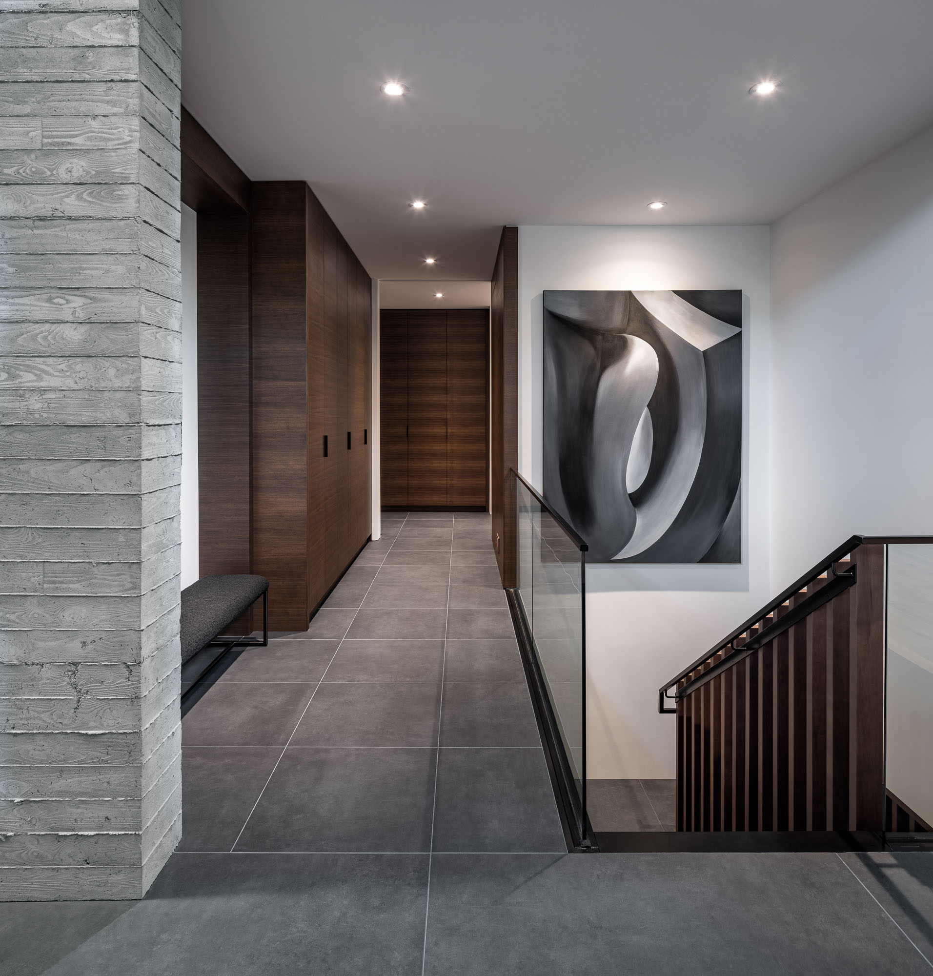 A passageway with tiny spots on the ceiling 