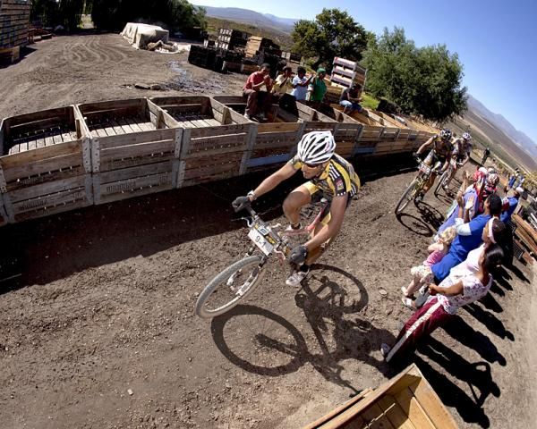 Kevin Evans of Team MTN Qhubeka Topeak Ergon passes cheering local farm staff
