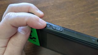Power button on Nintendo Switch.
