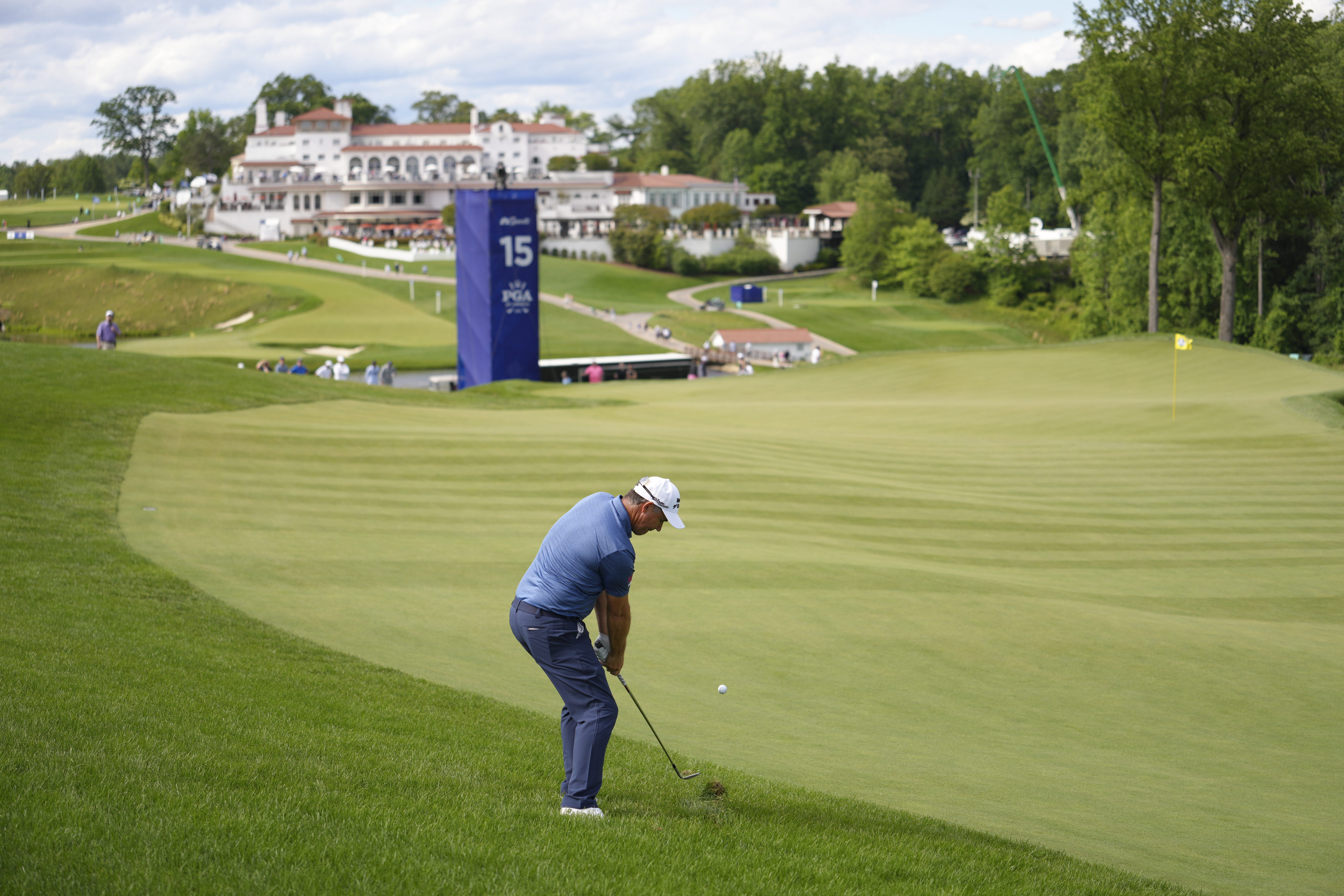 Padraig Harrington hits a wedge shot into the 15th green