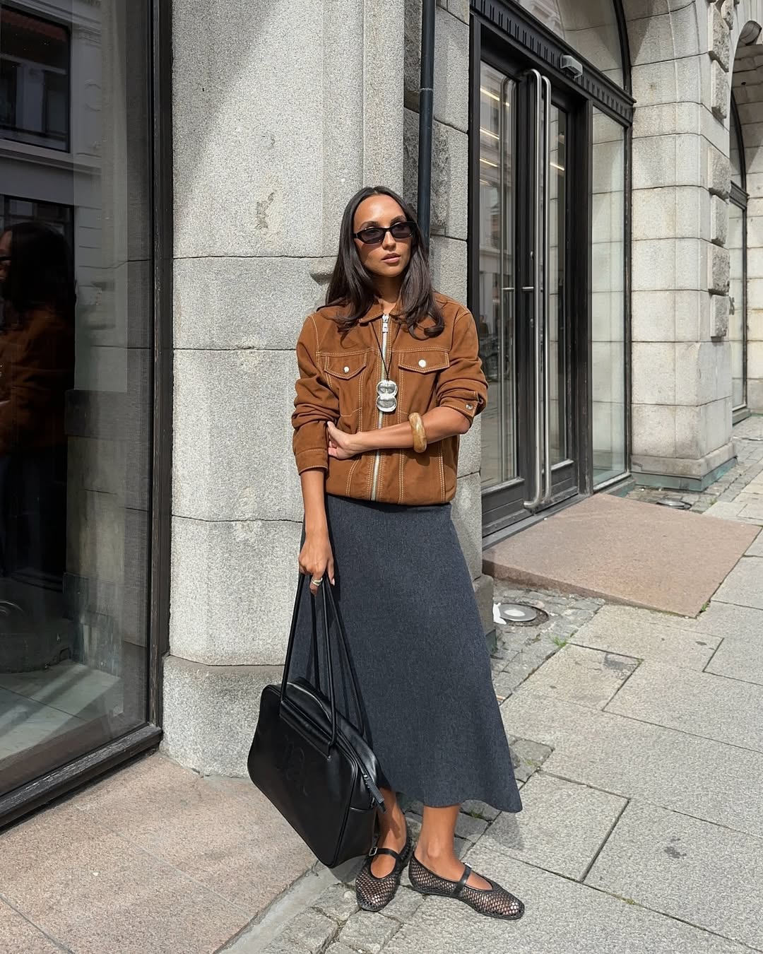 Ingrid in suede jacket and midi skirt