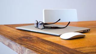 Glasses on a Macbook