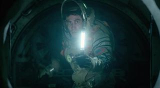 Life (2017) - Astronaut David Jordan exploring a dark space station.