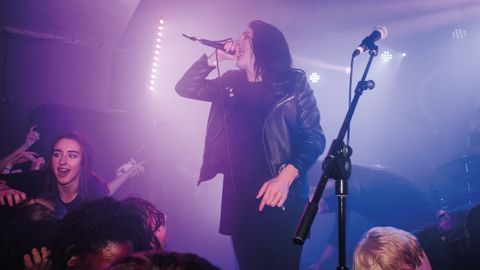 A photograph of Creeper on stage