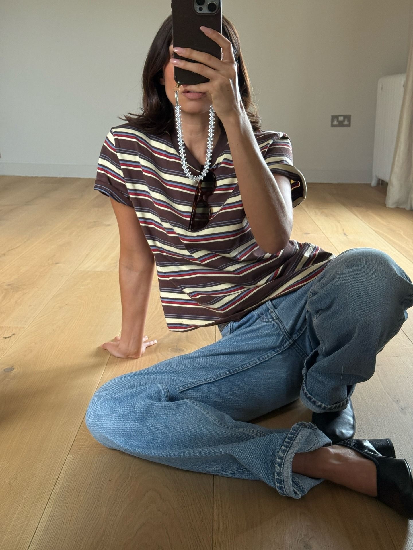 Influencer Marianne Smyth wearing a retro striped tee.