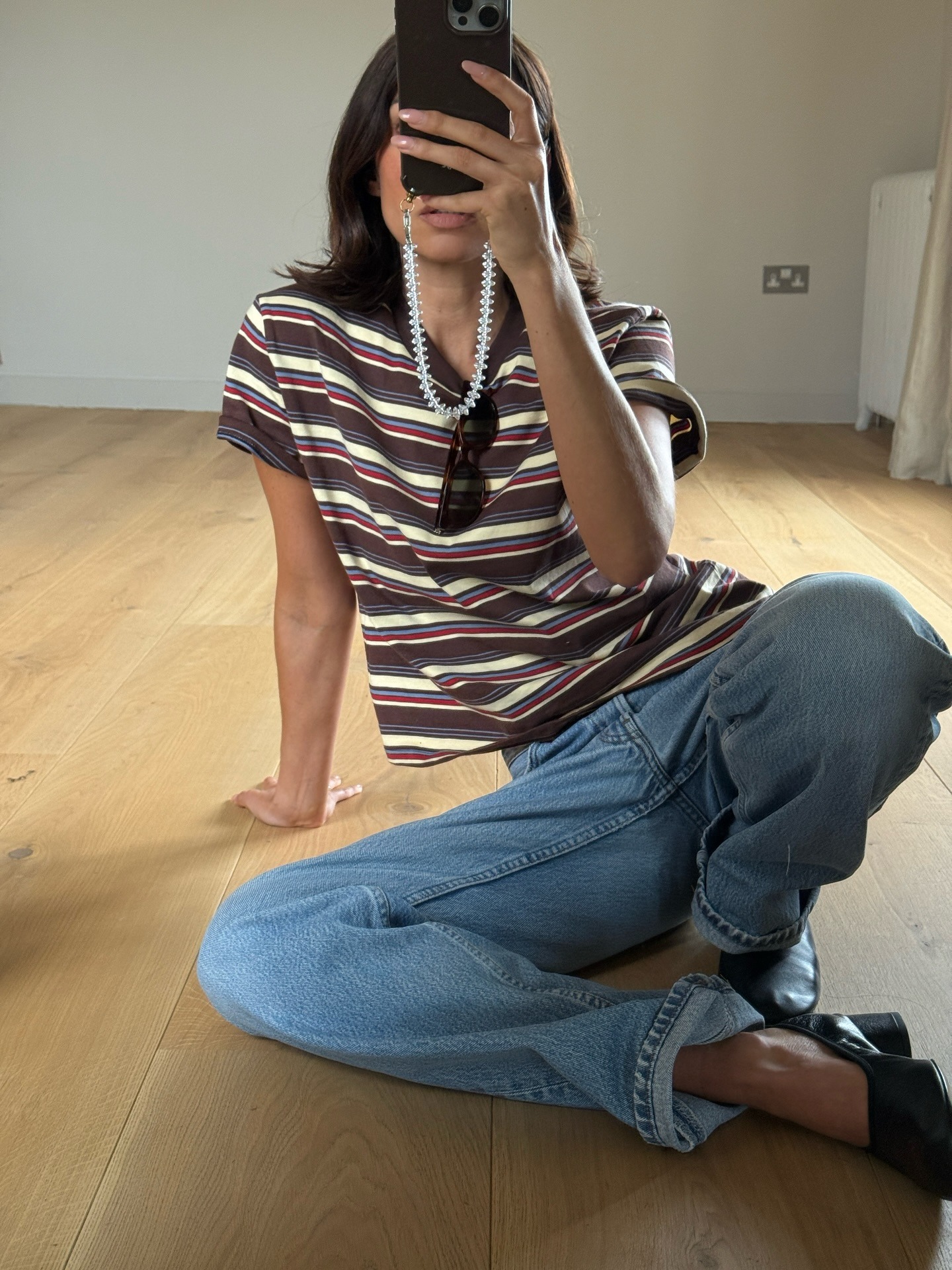 Influencer Marianne Smyth wearing a retro striped tee.