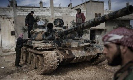 Members of the Free Syrian Army prepare to fight on February 23, 2012: The anti-Assad group has taken up arms once again because, it says, the Assad regime had never taken the April 12 ceasef