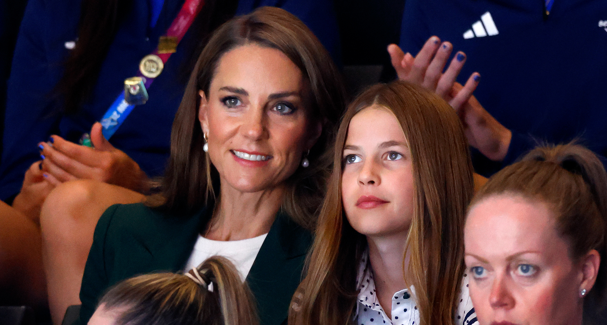 Princess Kate and Princess Charlotte sitting next to each other at the Commonwealth Games
