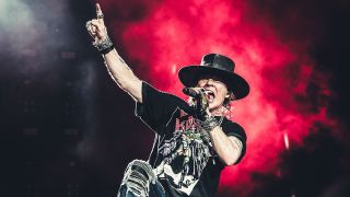 a shot of axl rose on stage