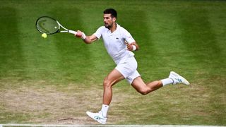 Serbia's Novak Djokovic returns the ball to Russia's Andrey Rublev during their men's singles quarter-finals tennis match on the ninth day of the 2023 Wimbledon Championships at The All England Tennis Club in Wimbledon, southwest London, on July 11, 2023