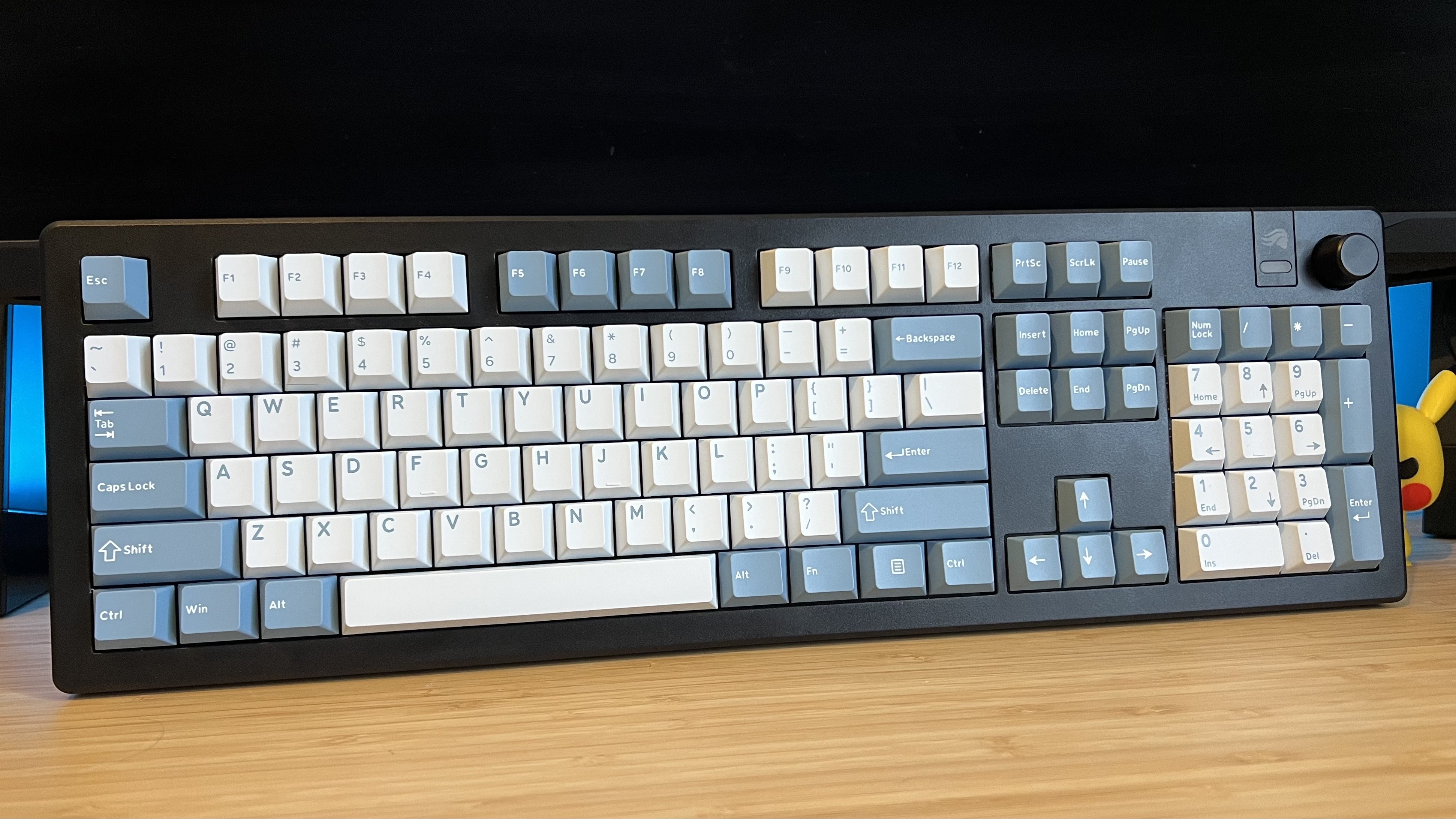 Ghost Judge keycaps on Glorious GMMK 3 keyboard on a wooden desk