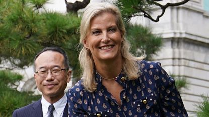 Sophie, Duchess of Edinburgh smiles as she takes part in a ceremonial planting of an oak in Japan
