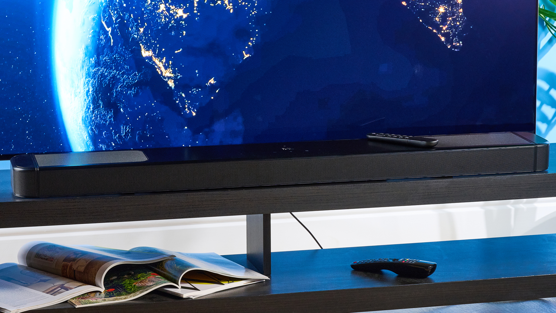 the jbl bar 1300xmk2 in black photographed against the blue tom's guide background