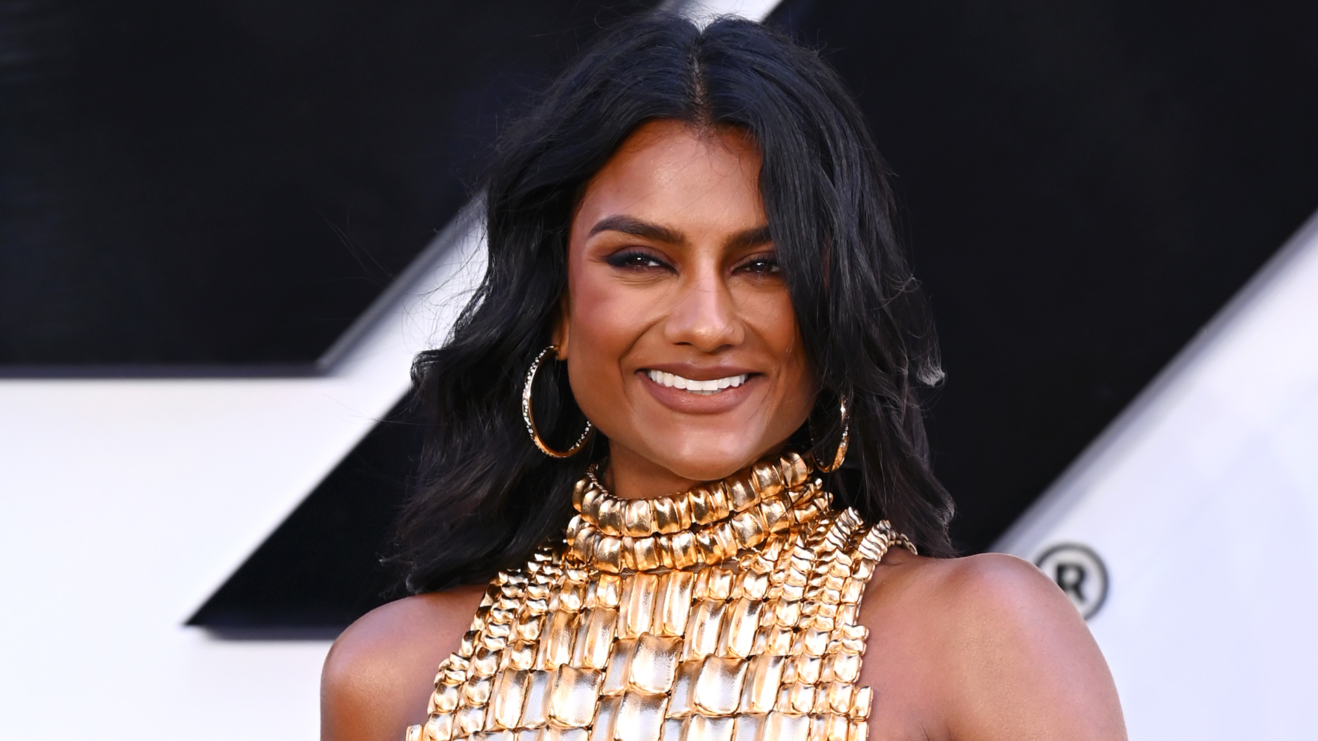 Simone Ashley styled the same UFO Monse dress Taylor Swift wore to the 2024 MTV VMAs