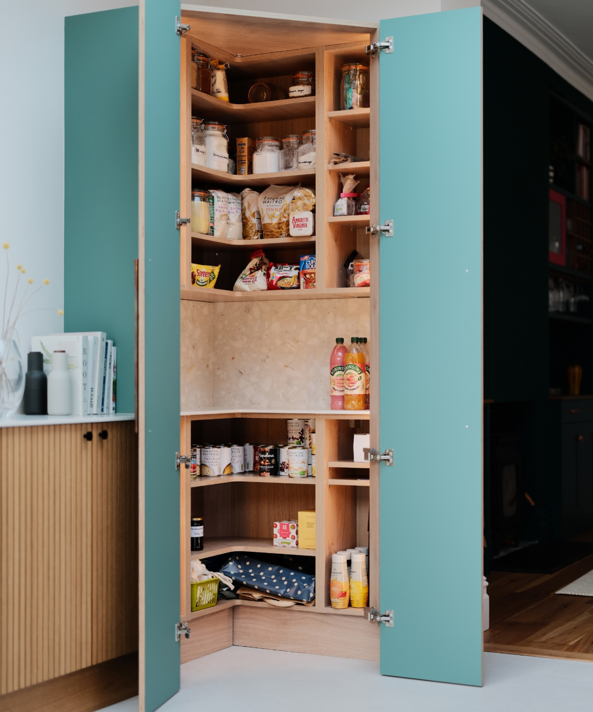 corner pantry unit with shelving and worktop space