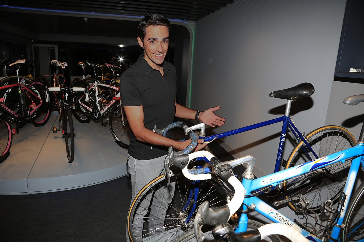 Contador shows off his first bike, an Orbea that he made up to look like a Macario