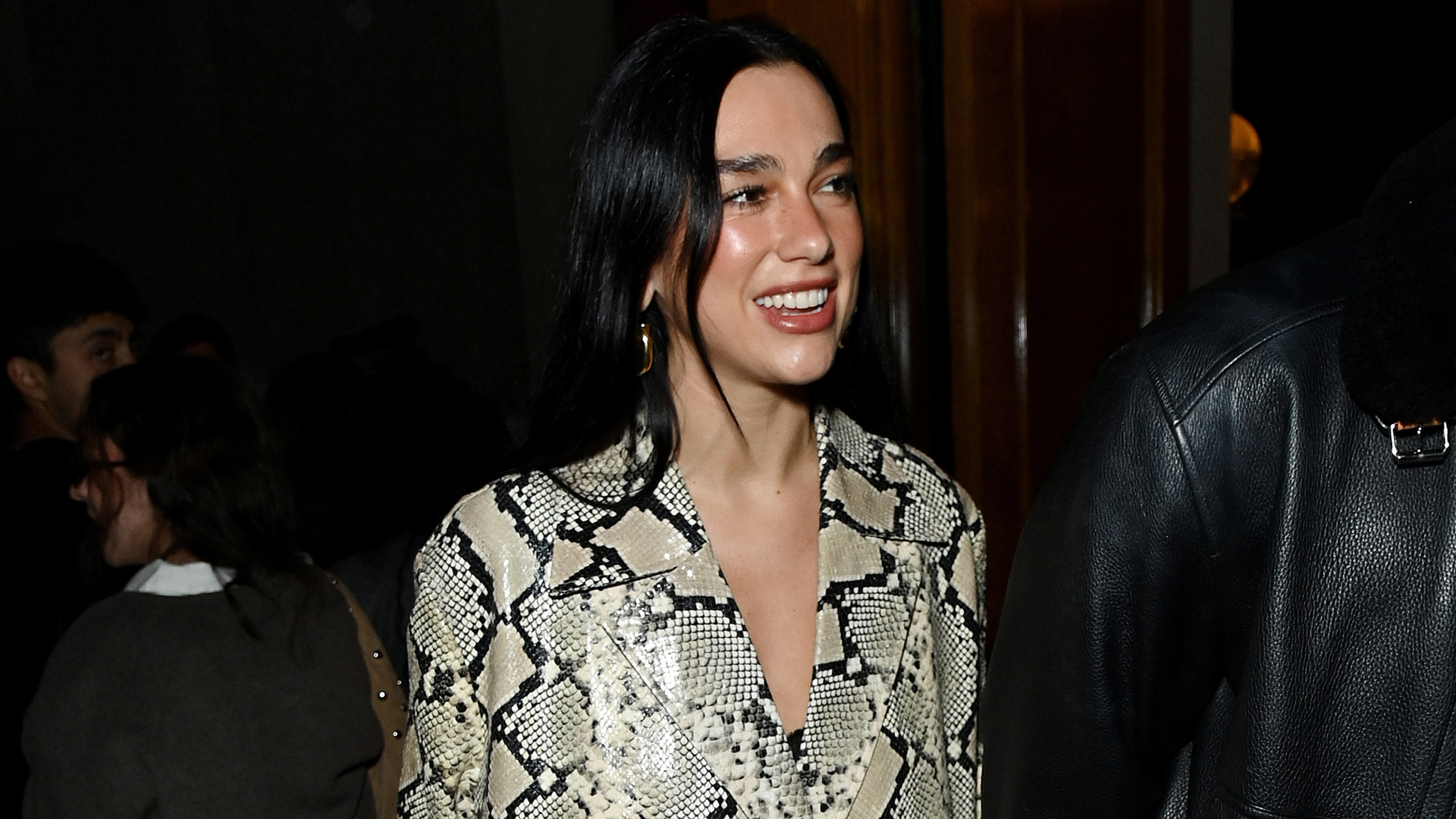 Dua Lipa wore a green bra and jeans with rare Nike Jacquemus moon sneakers