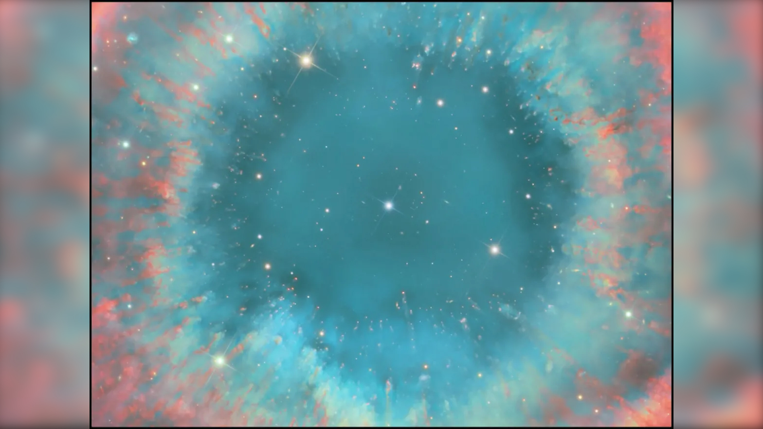 The Helix Nebula is 650 light years away, but this shot reveals galaxies far beyond even that
