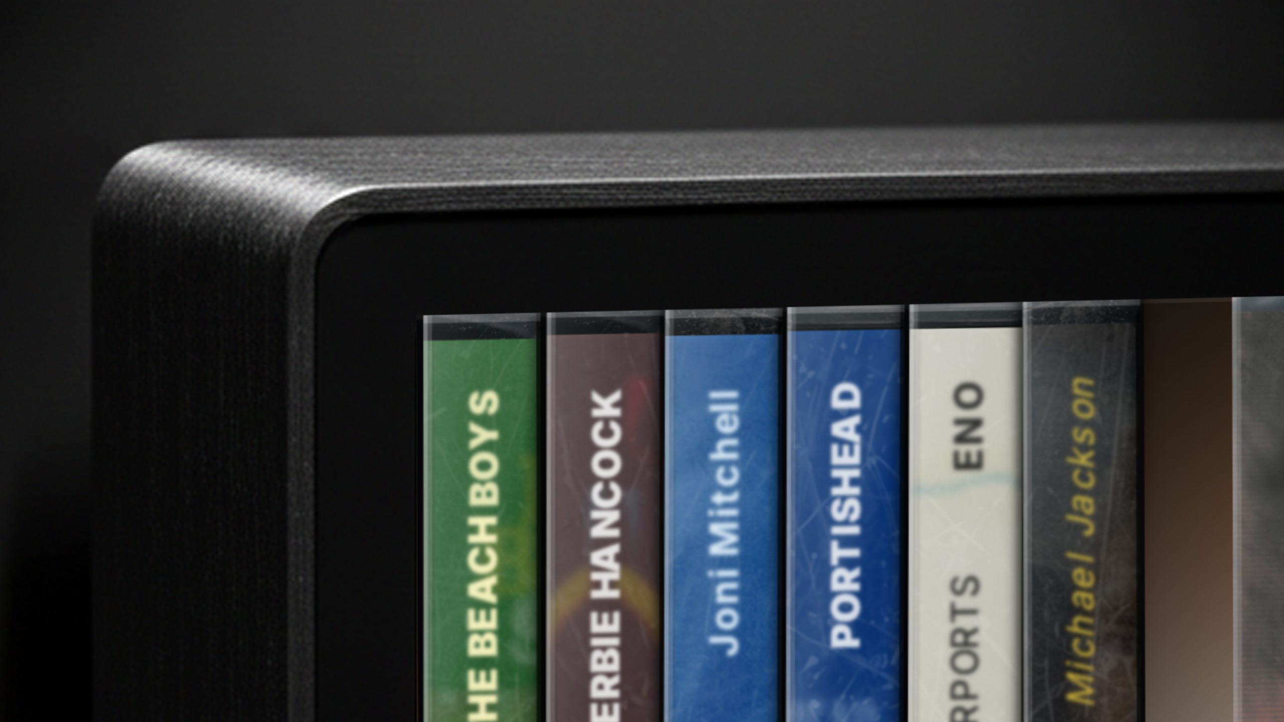 A close up of the Spine Music display album order