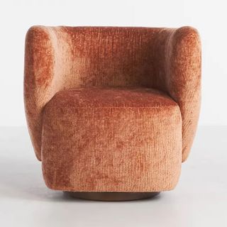 Swivel chair in terracotta