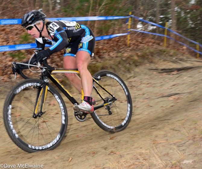 Elle Anderson (Ladies First Racing) descending out of the woods with a lead