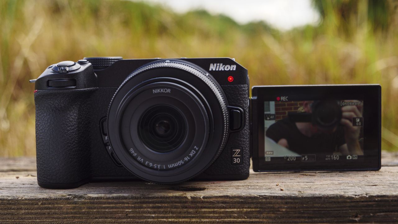 Nikon Z30 on a wooden bench with the viewfinder pulled out