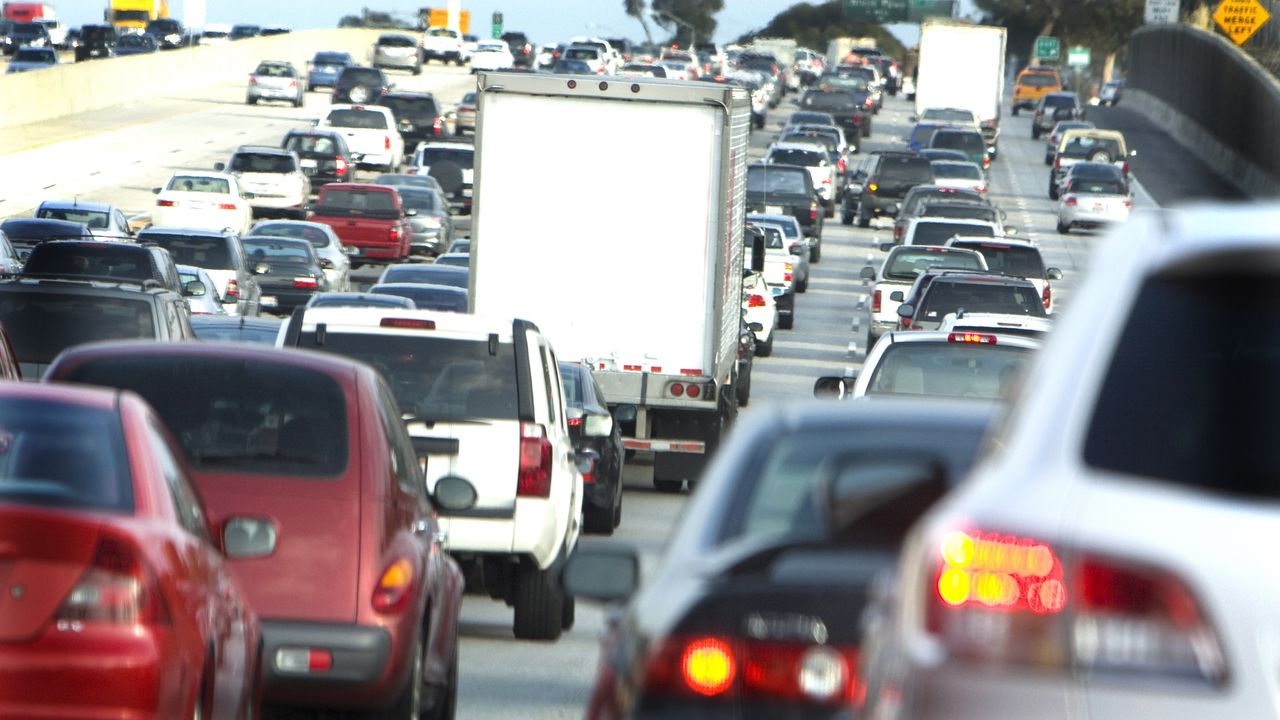 Cars are caught in a traffic jam on the highway.