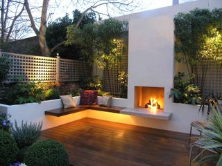 living gardens decking with fire place