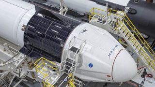 SpaceX's Falcon 9 rocket and Crew Dragon spacecraft are pictured in the hanger at Launch Complex 39 A on May 20, 2020.