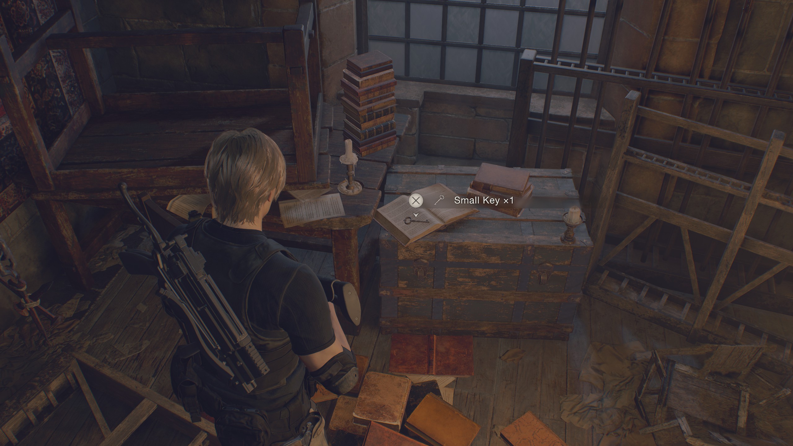 Resident Evil 4 Remake small key lying on a book