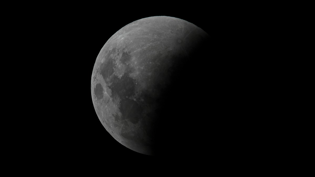 The moon is seen during a penumbral lunar eclipse in Buenos Aires on May 15, 2022.