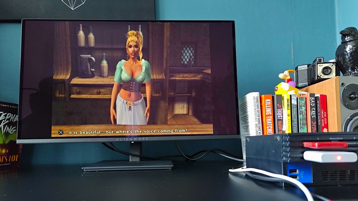 Alienware AW2726DM monitor with PS2 connected via upscaler and Baldur's Gate Dark Alliance gameplay on screen and correct 4:3 visuals at 1080p.