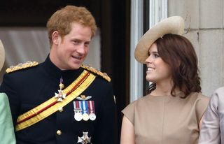 Prince Harry and Princess Eugenie stand on the balcony of Buckingham Palace during Trooping the Colour on June 13, 2015 in London, England