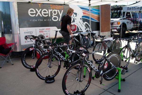 The Felt DA time trial bikes of the Exergy men's team are positioned for the rider warmup.