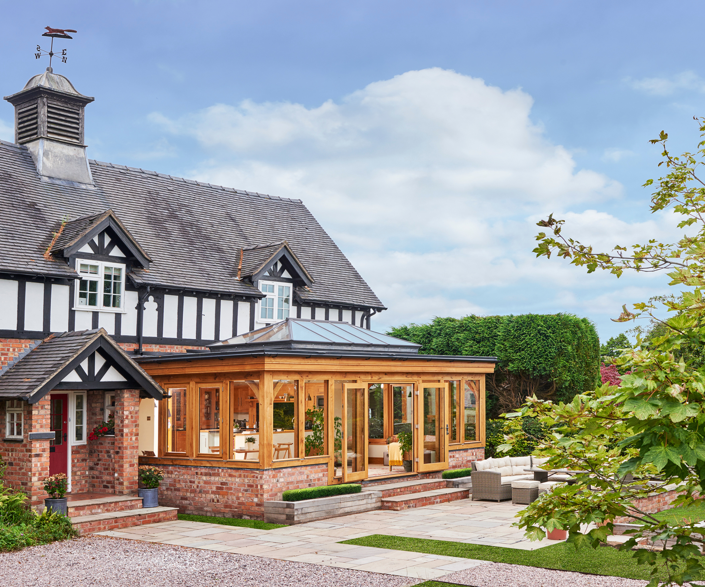 timber and brick orangery on large period property