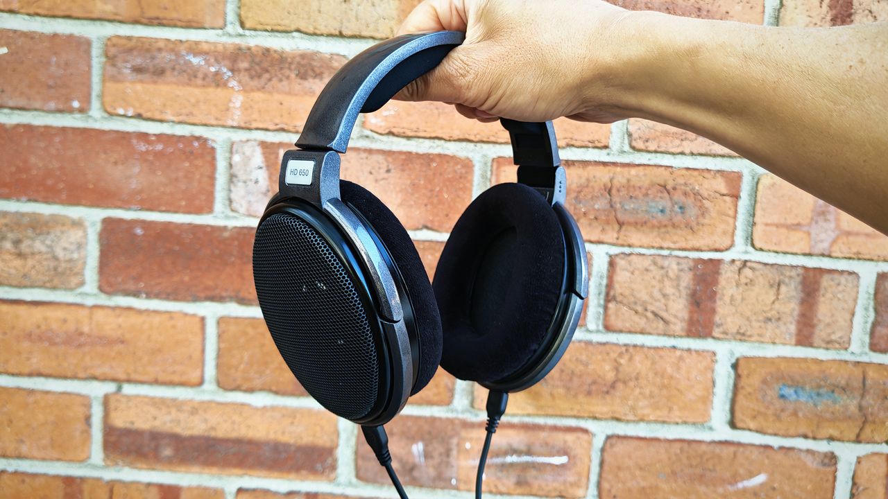 Photos featuring the Bose QC Ultras and the Sennheiser HD 650s.