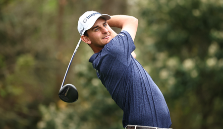 Mac Meissner hits a driver off the tee and watches its flight