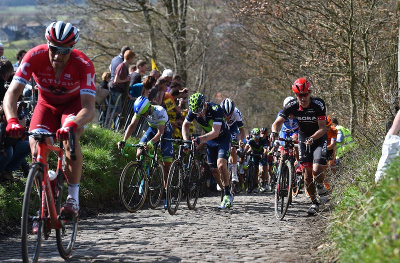 Riders struggle up the Koppenberg