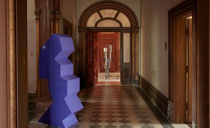 Arched doorway in historical villa with sculptural display on show during Melbourne Design Week 2022