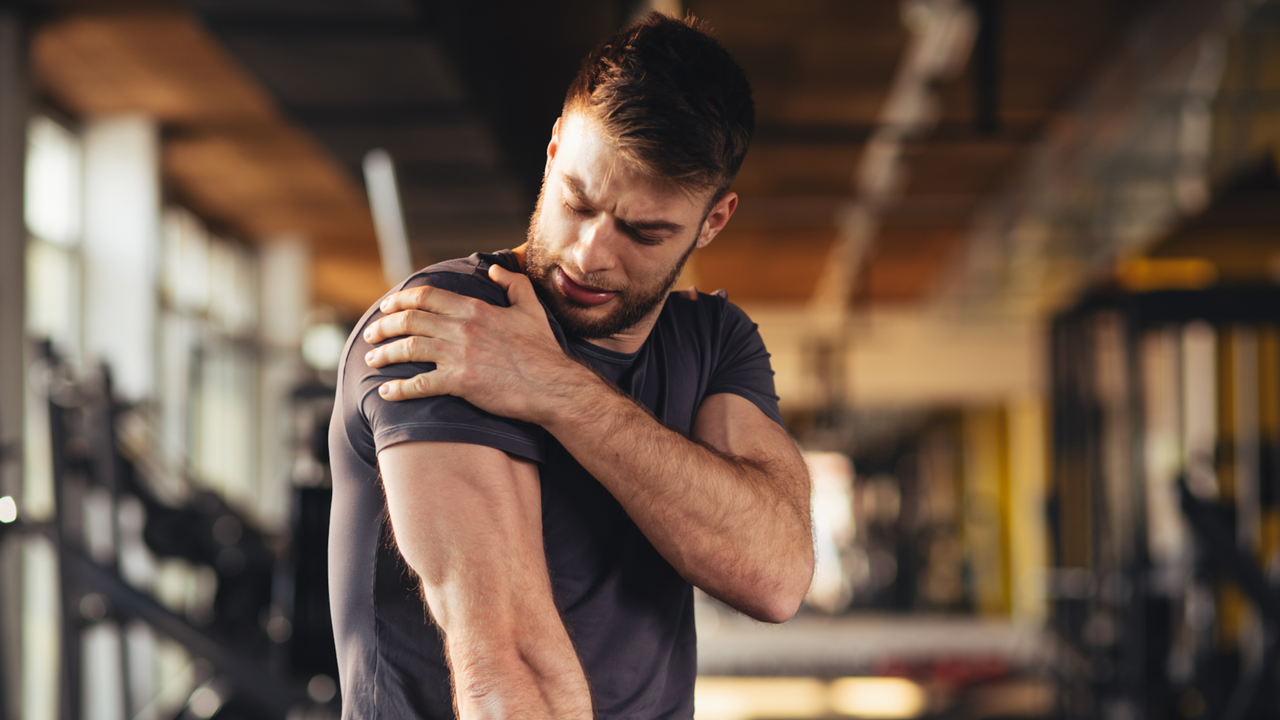 Man with muscle soreness