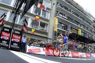 Frances Sylvain Chavanel celebrates on the finish line as he wins the 201 km and second stage of the 2010 Tour de France cycling race run between Brussels and Spa on July 5 2010 in Spa AFP PHOTO NATHALIE MAGNIEZ Photo credit should read NATHALIE MAGNIEZAFP via Getty Images