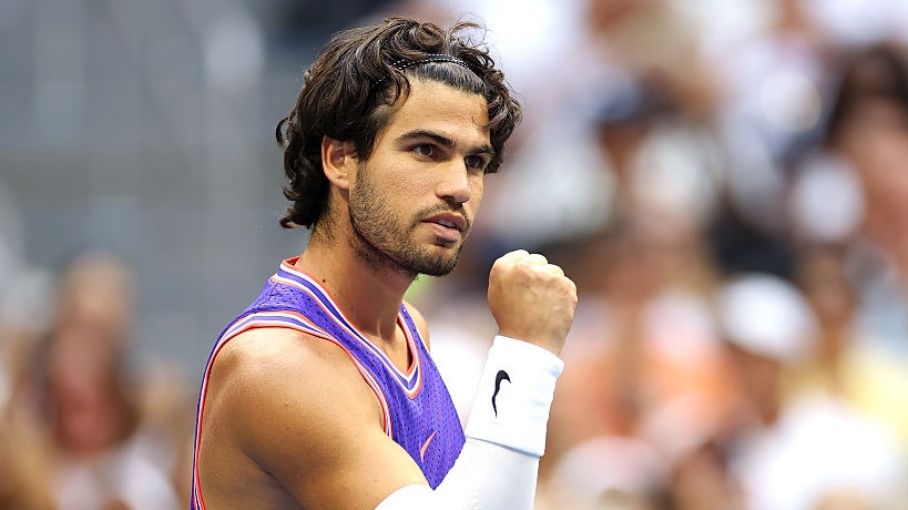 Carlos Alcaraz of Spain reacts with partner Serena Williams of the United States in their mixed doubles match against Erin Routliffe and Lloyd Glasspool.