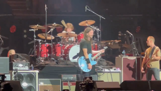 Shane Hawkins performs with the Foo Fighters at the Taylor Hawkins tribute concert in LA