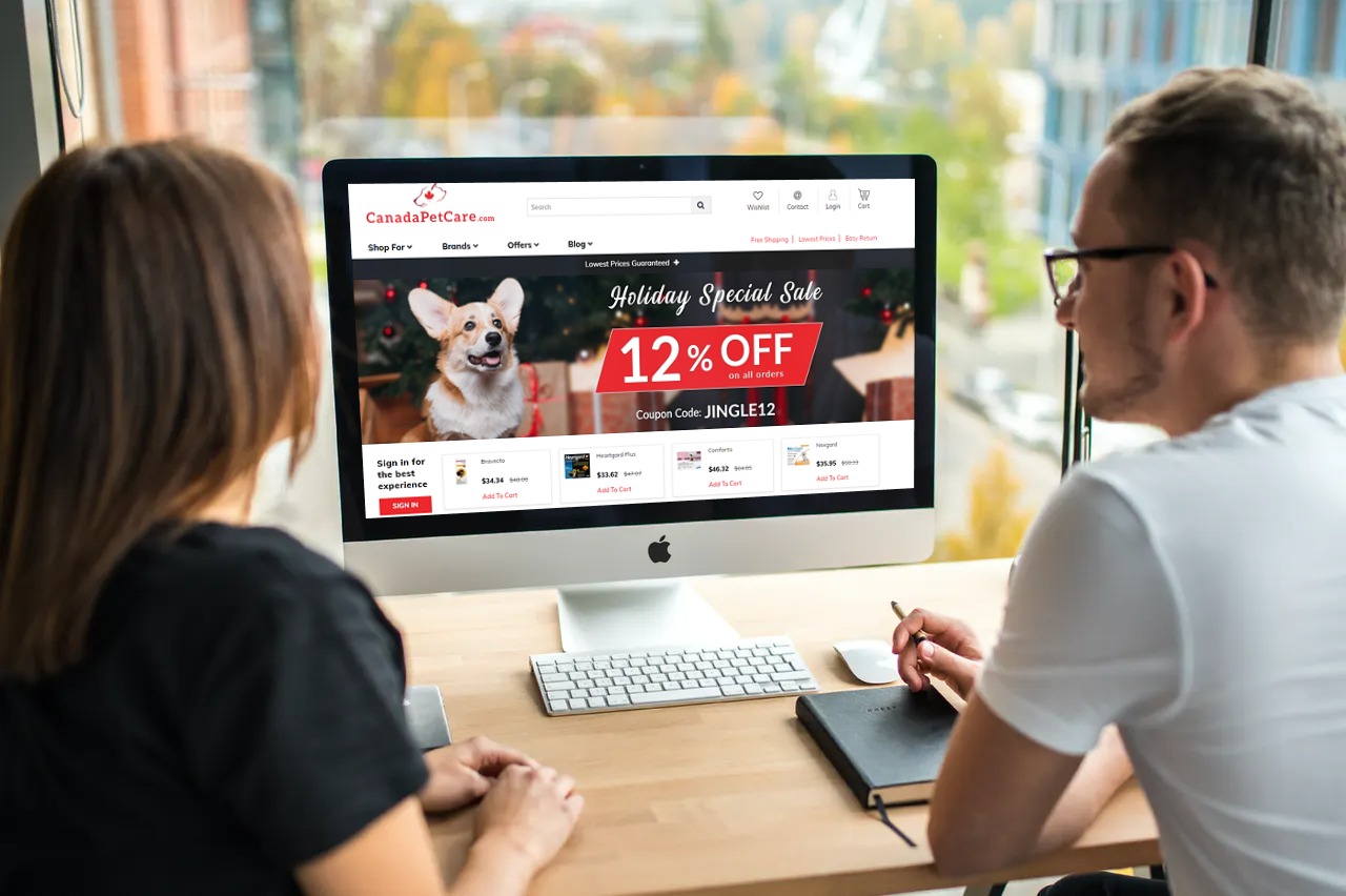 An image of two people browsing the CanadaPetCare website.