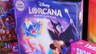 Disney Lorcana Gateway box alongside other board games