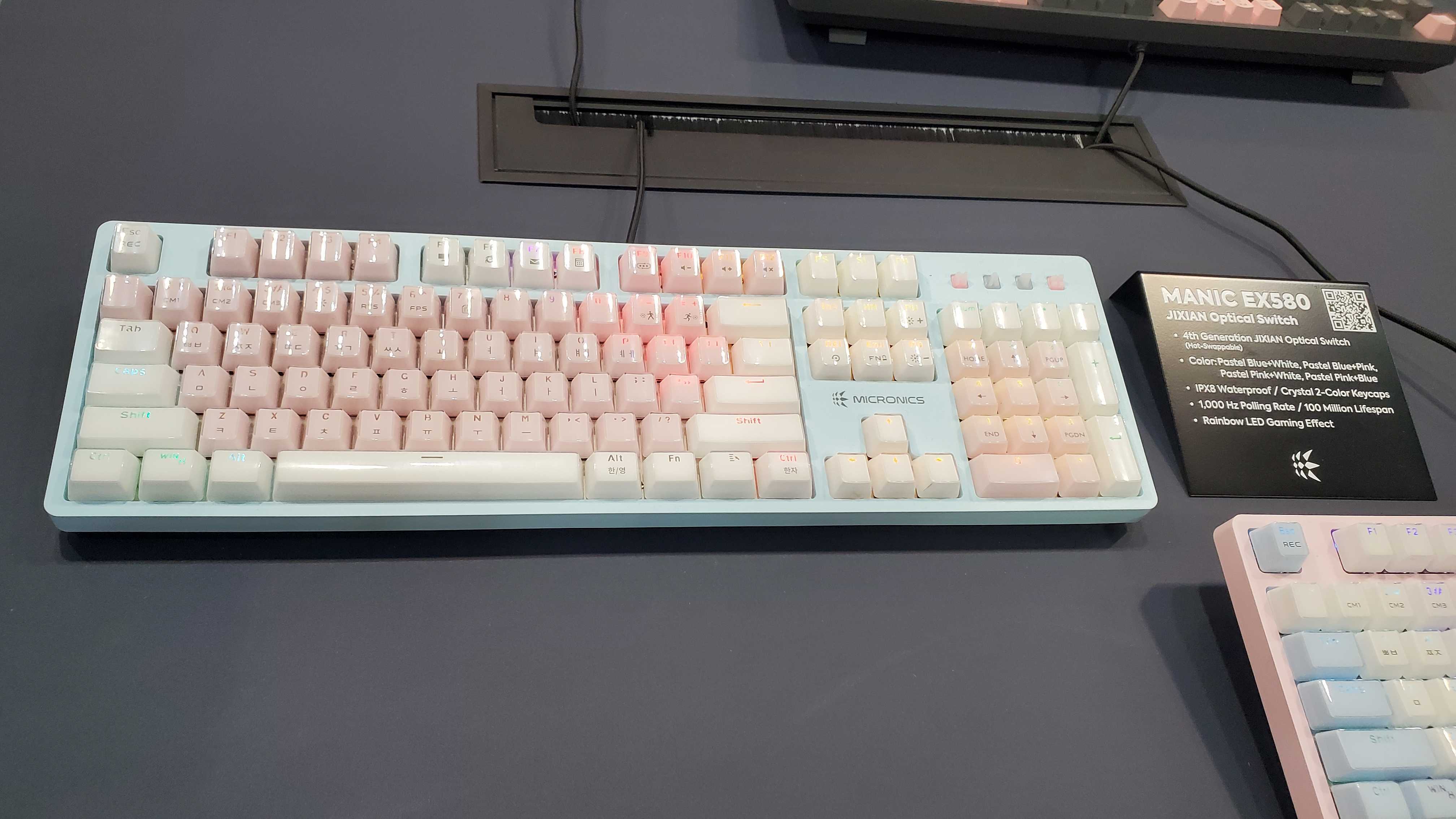 pink and blue keyboard with backlight