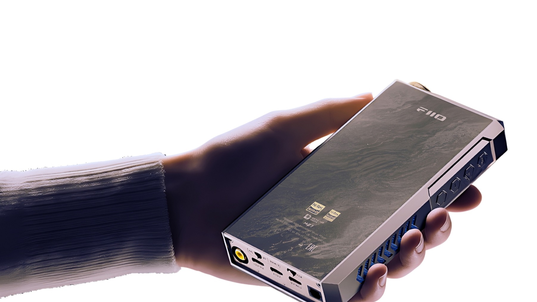 Fiio M27 portable music player held in the hand